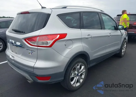2014 Ford Escape Titanium z USA, uszkodzony, nr VIN 1FMCU9JX3EUD57511